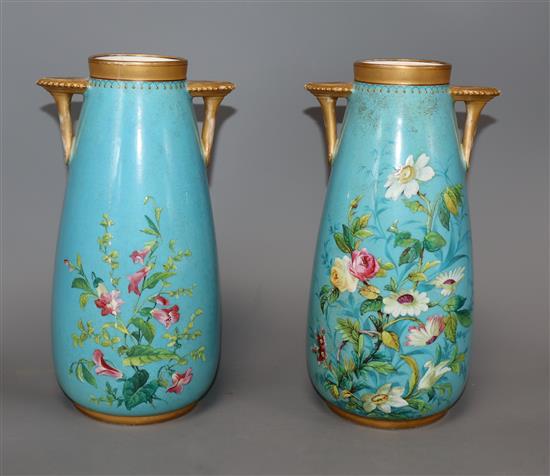 A pair of turquoise floral Worcester vases 23cm high